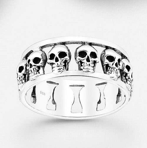 STERLING SILVER BAND OF SKULLS RING
